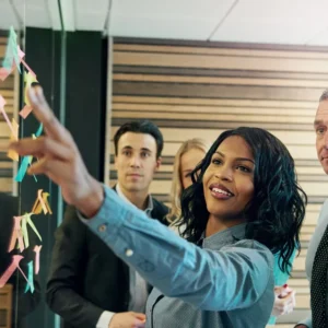 Team brainstorming with colorful sticky notes.